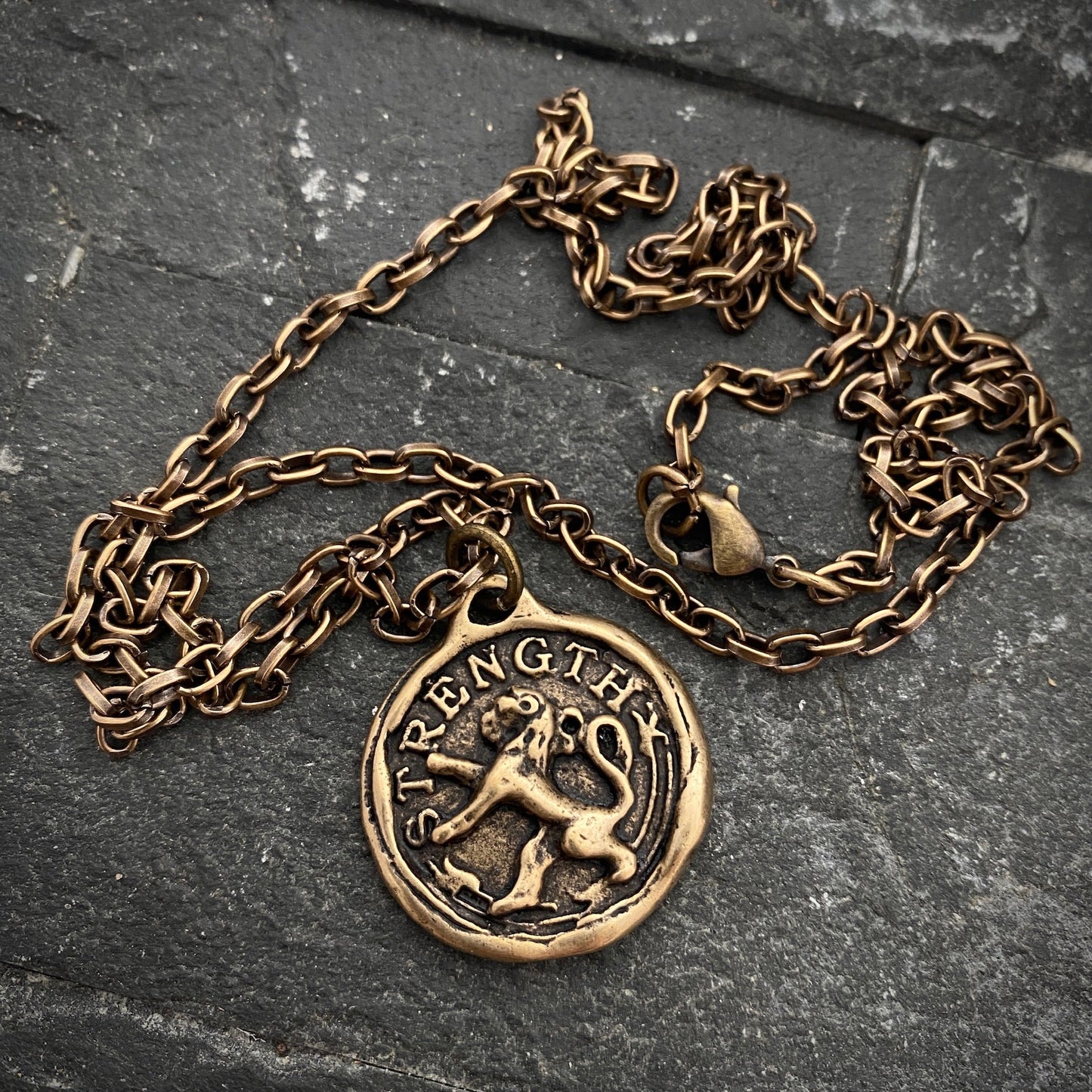 Vintage Gentlemen “Strength” Bronze Lion Pendant